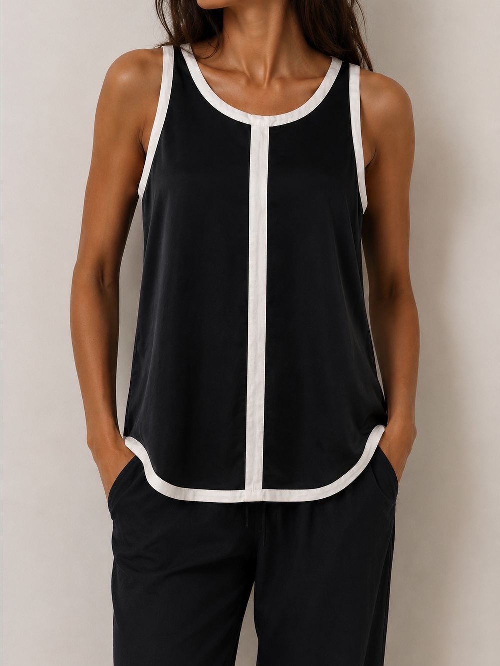 Aryn K Black Silk Top with White Care Tag Detail